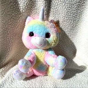 Stuffed Unicorn in Tie Dye Plush with iridescent feet. Unicorn is 18 inc…